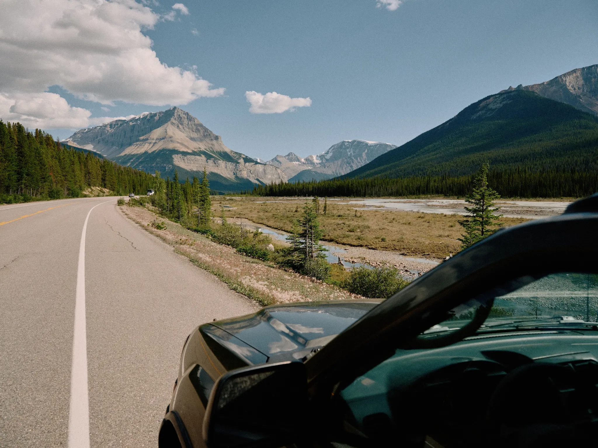 View from my car with mountains in the distance